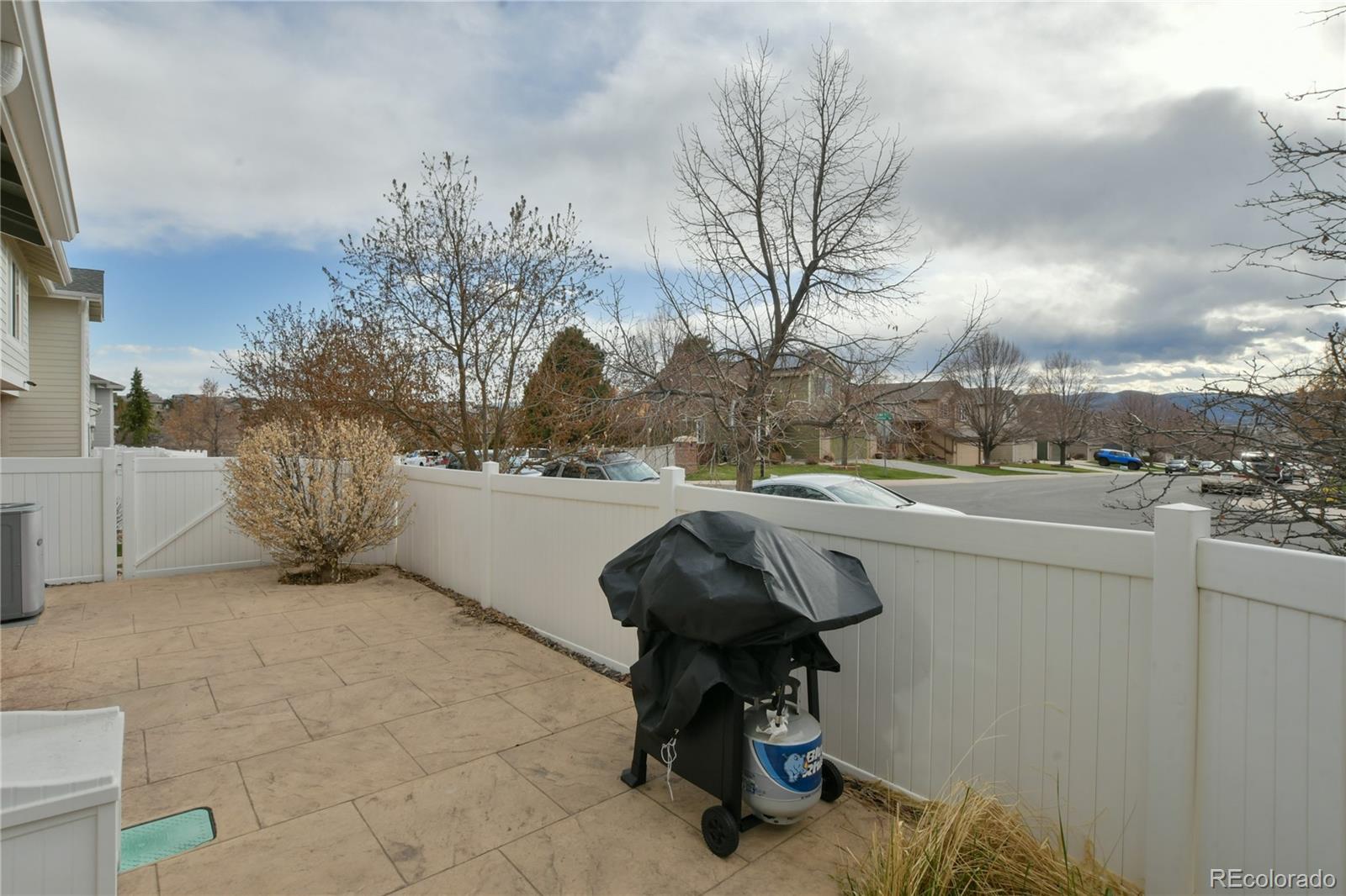 156 Whitehaven Circle Highlands Ranch, CO 80129 - Photo 28 of 30 a view of balcony with table and chairs