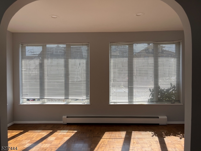 a view of two windows in a room
