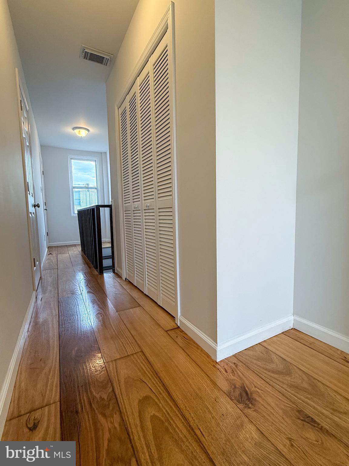 2079 Anchor Street Philadelphia, PA 19124 - Photo 21 of 26 a view of a livingroom with wooden floor and staircase