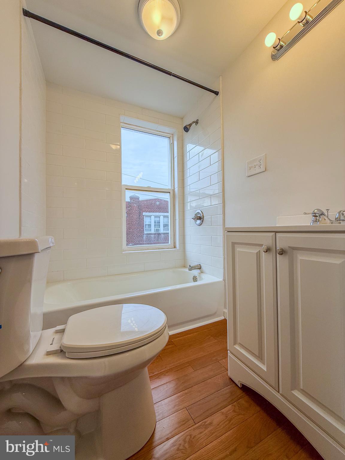 2079 Anchor Street Philadelphia, PA 19124 - Photo 22 of 26 a bathroom with a toilet a sink and a shower