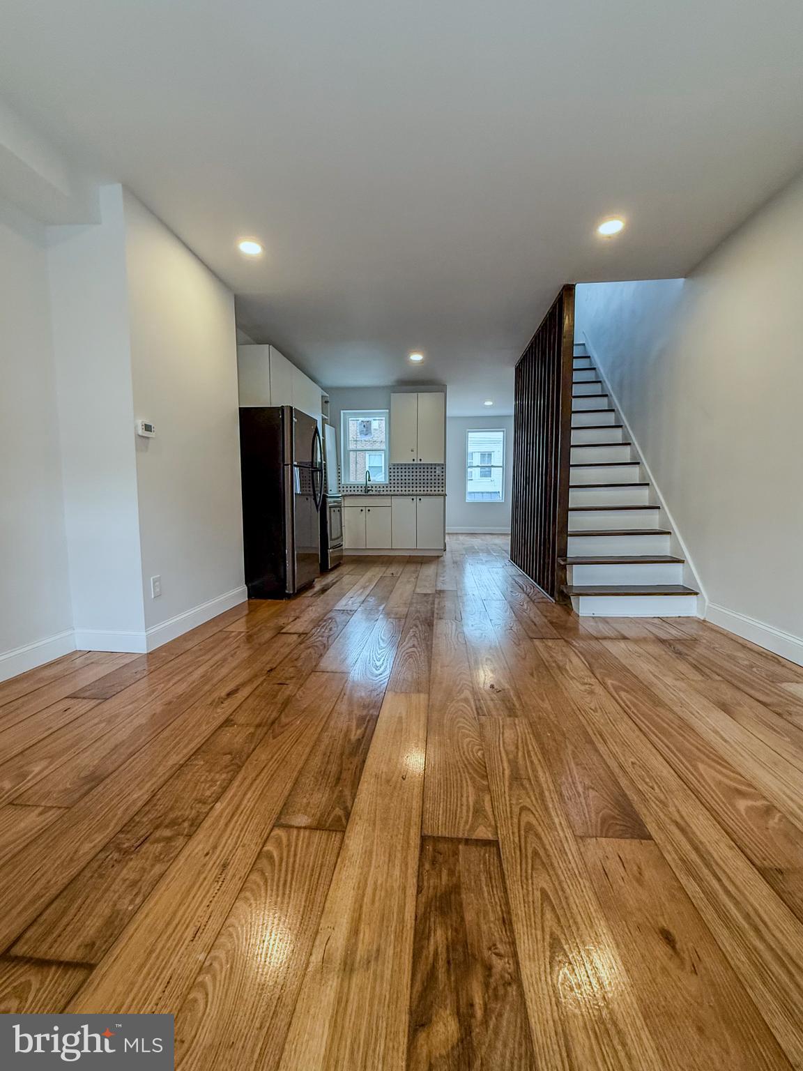 2079 Anchor Street Philadelphia, PA 19124 - Photo 6 of 26 a view of a room with wooden floor and stairs