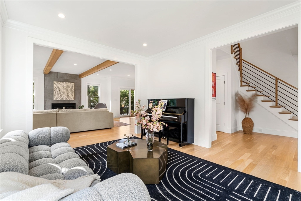 39 Donna Road Needham, MA 02494 - Photo 15 of 42 a living room with furniture and a flat screen tv