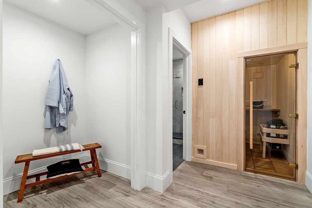 39 Donna Road Needham, MA 02494 - Photo 34 of 42 a room with furniture and wooden floor