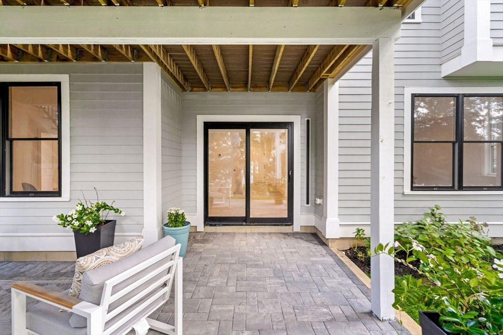 39 Donna Road Needham, MA 02494 - Photo 41 of 42 a front view of a house with a yard