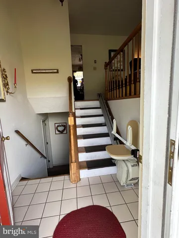 a view of entryway with a front door