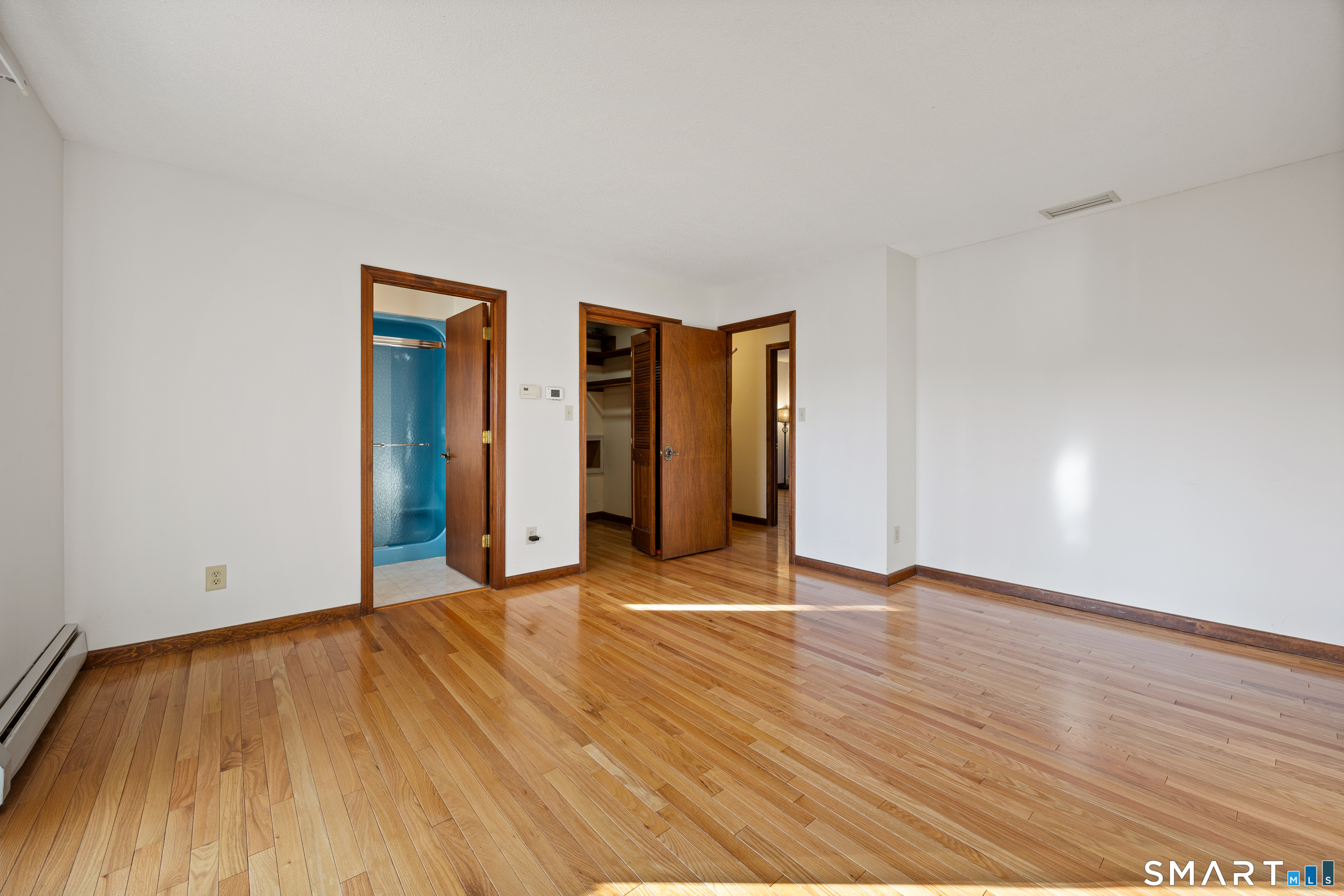 622 Lakeside Boulevard West Waterbury, CT 06708 - Photo 21 of 40 a view of an empty room with wooden floor