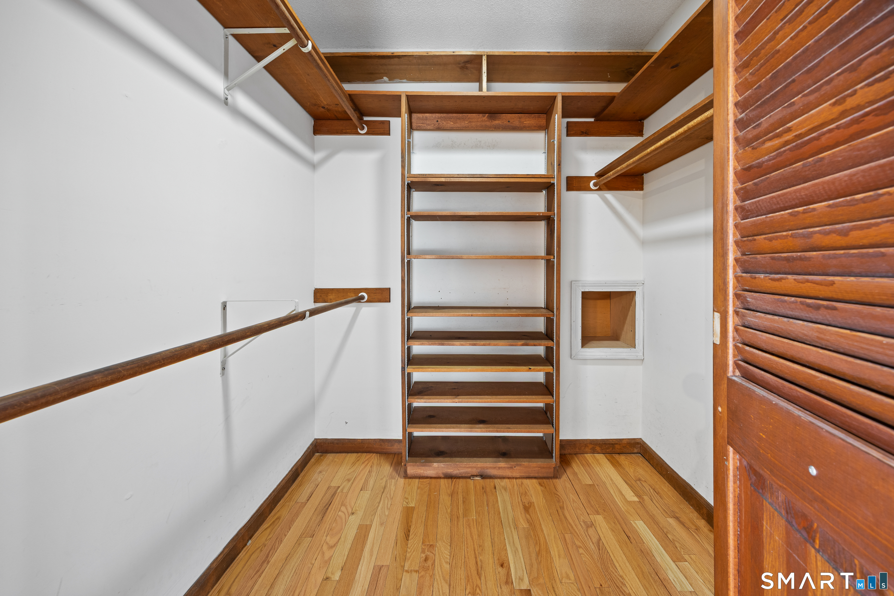 622 Lakeside Boulevard West Waterbury, CT 06708 - Photo 23 of 40 a view of entryway with wooden floor