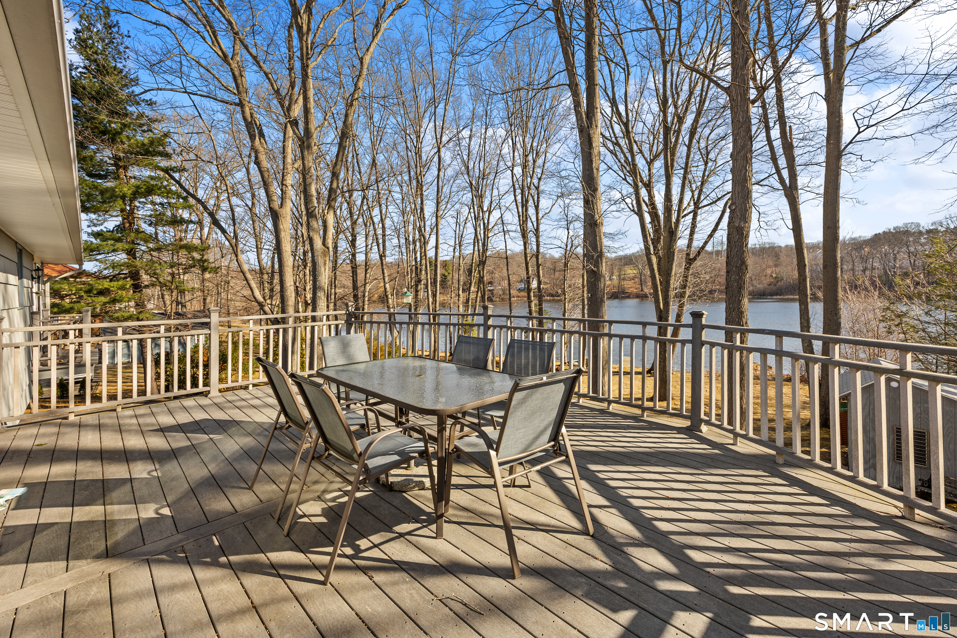 622 Lakeside Boulevard West Waterbury, CT 06708 - Photo 29 of 40 a view of a chairs and table on the wooden floor
