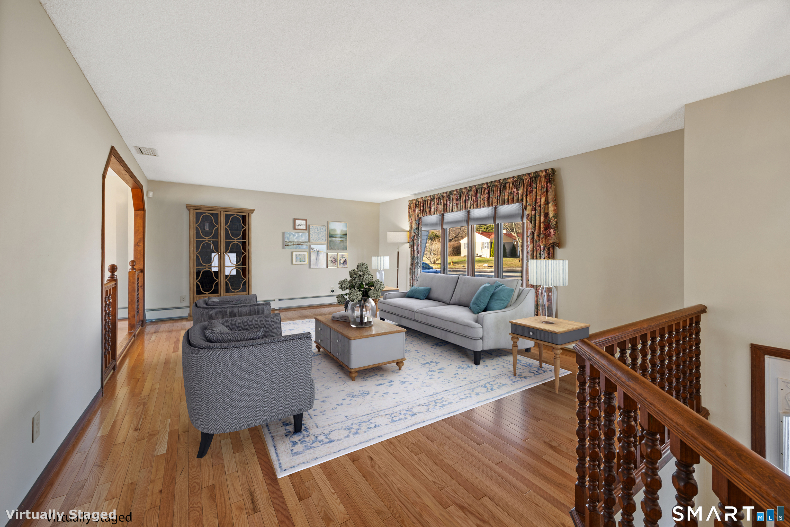 622 Lakeside Boulevard West Waterbury, CT 06708 - Photo 7 of 40 a living room with furniture and a wooden floor