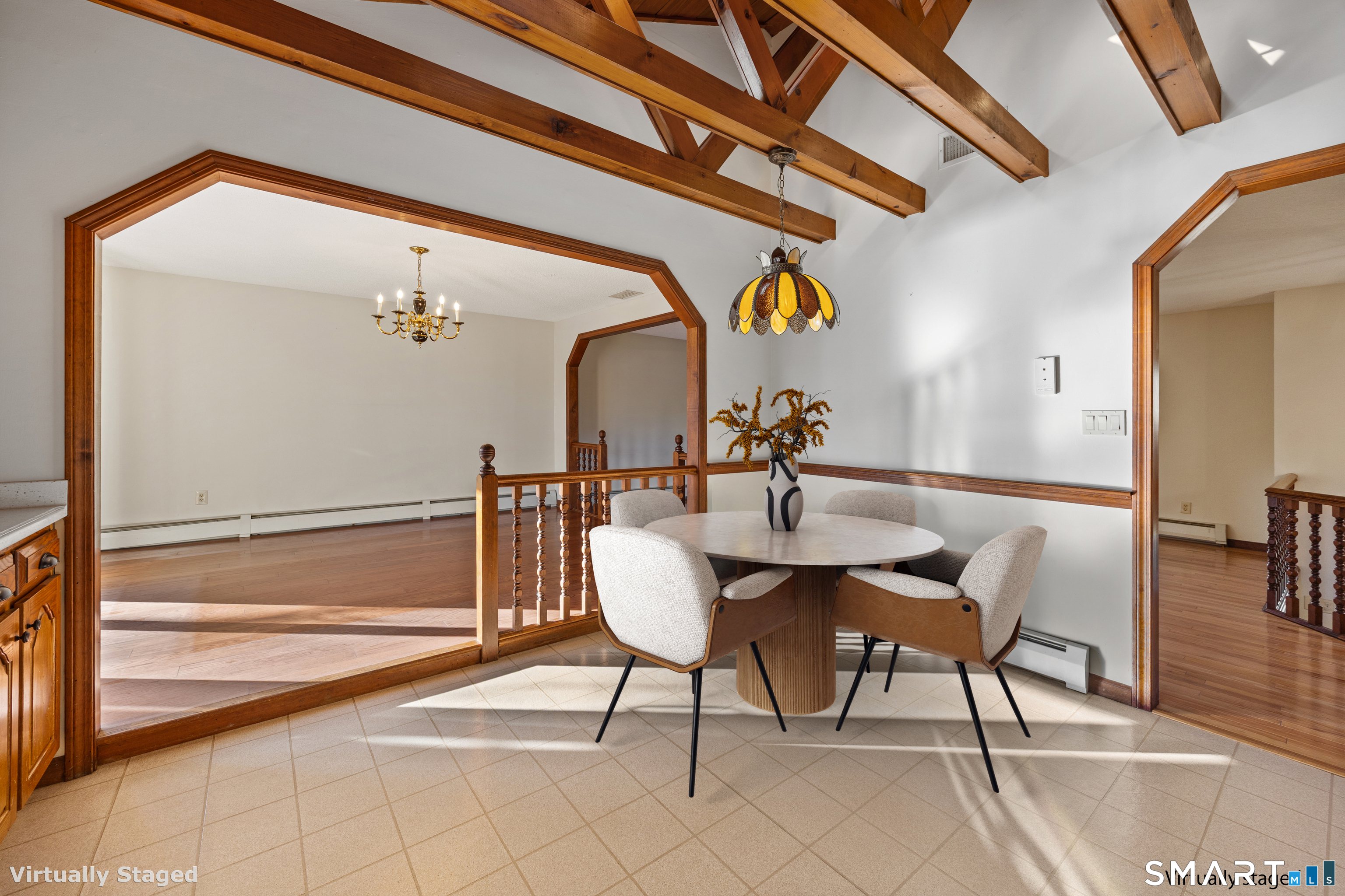 622 Lakeside Boulevard West Waterbury, CT 06708 - Photo 10 of 40 a dining room with furniture and wooden floor