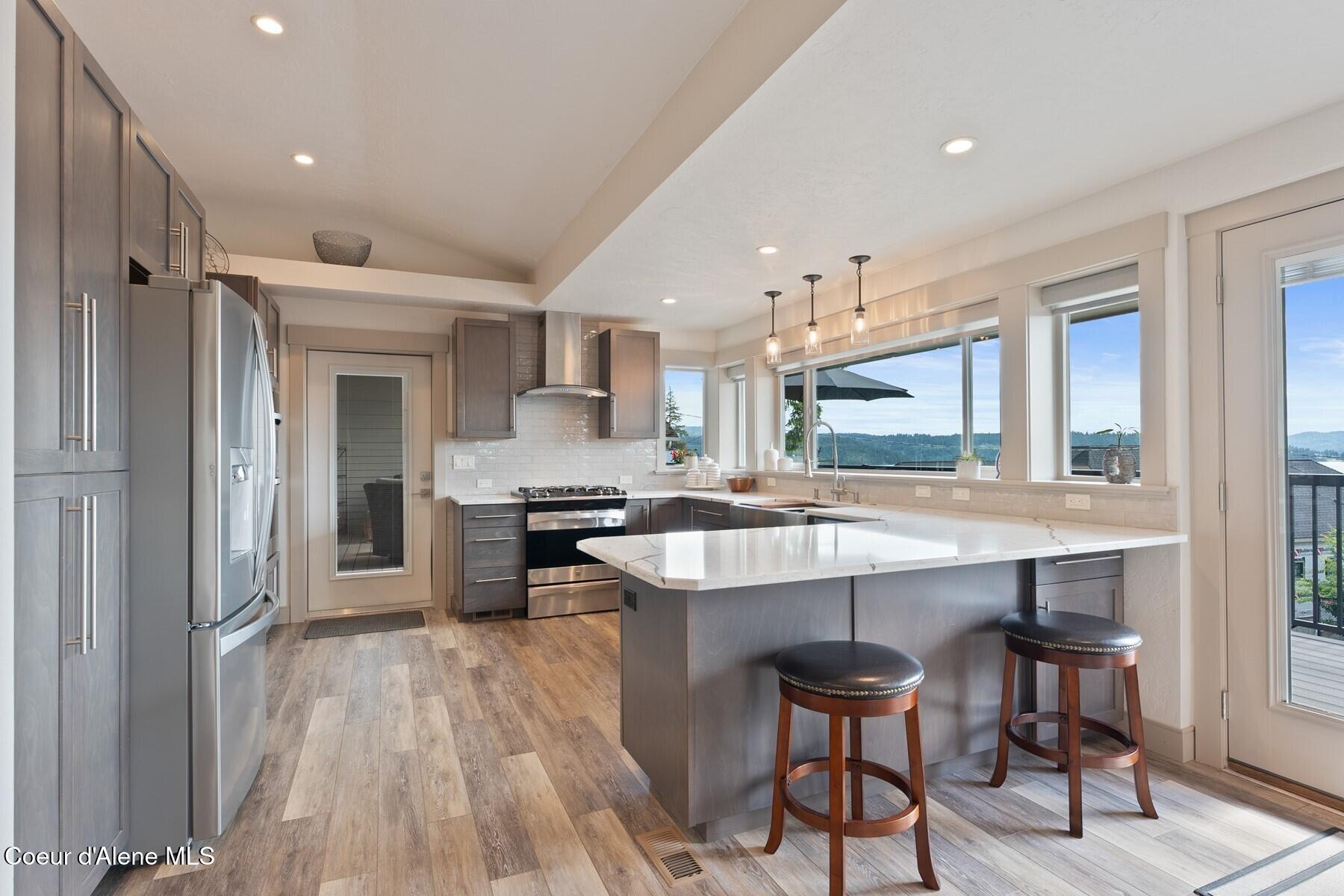 2406 South Silver Beach Road Coeur D'Alene, ID 83814 - Photo 10 of 43 Kitchen Door to Open Deck