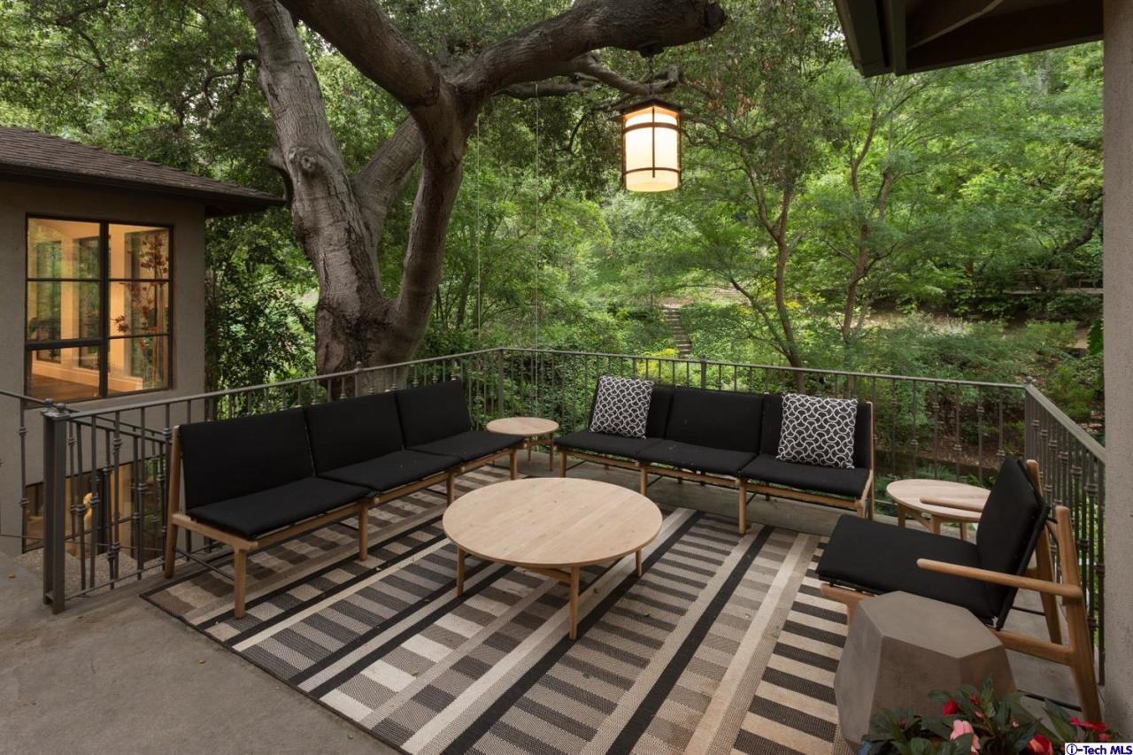 885 Laguna Road Pasadena, CA 91105 - Photo 11 of 33 a view of a balcony with chairs