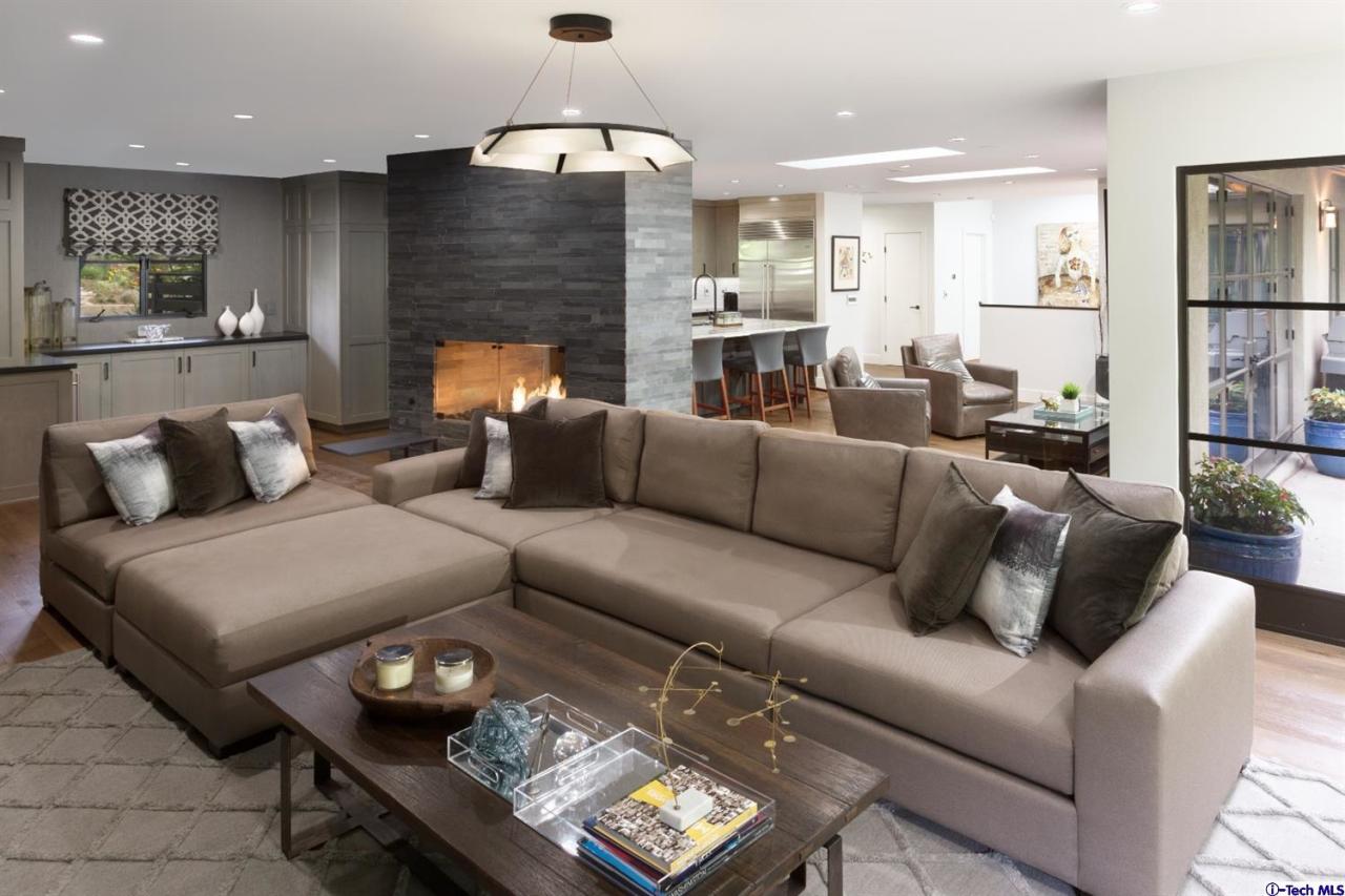 885 Laguna Road Pasadena, CA 91105 - Photo 12 of 33 a living room with furniture and a chandelier