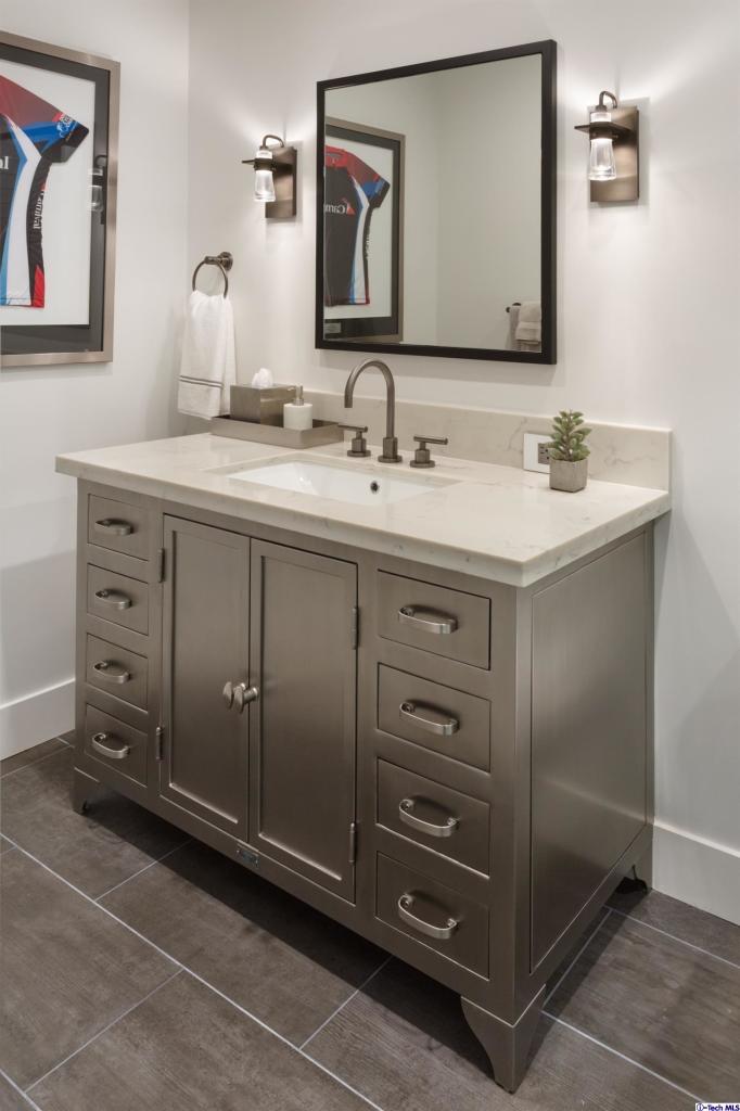 885 Laguna Road Pasadena, CA 91105 - Photo 20 of 33 a bathroom with a granite countertop sink vanity and mirror