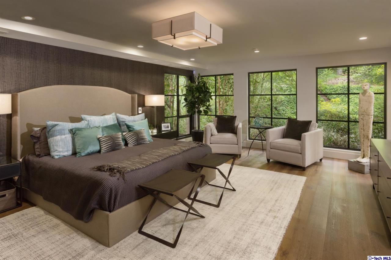 885 Laguna Road Pasadena, CA 91105 - Photo 21 of 33 a living room with furniture and a large window