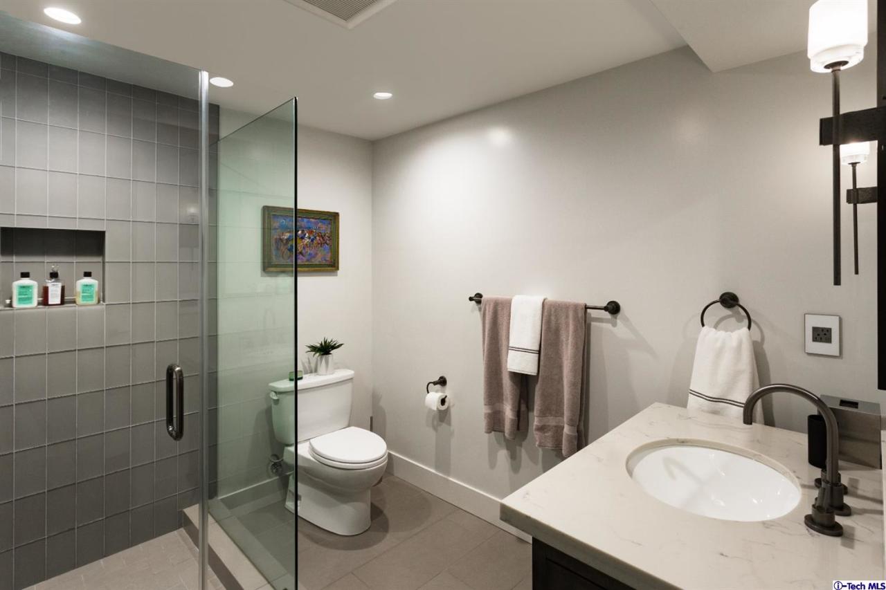 885 Laguna Road Pasadena, CA 91105 - Photo 27 of 33 a bathroom with a sink toilet and shower