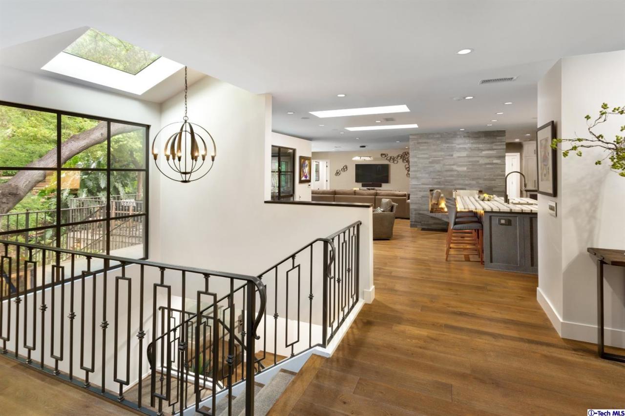 885 Laguna Road Pasadena, CA 91105 - Photo 5 of 33 a view of a kitchen with furniture and a large window