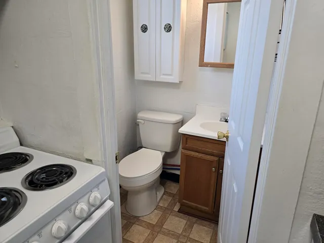 a bathroom with a sink and a toilet