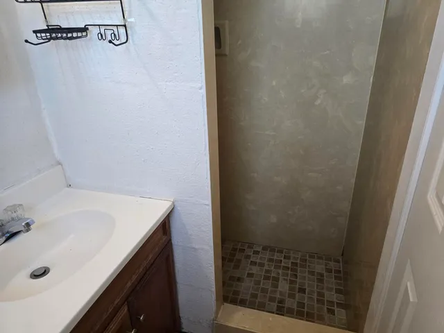 a bathroom with a sink and a tub