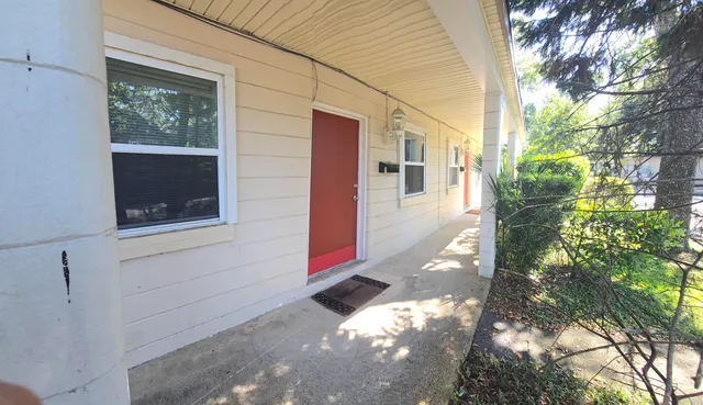 a view of backyard of the house