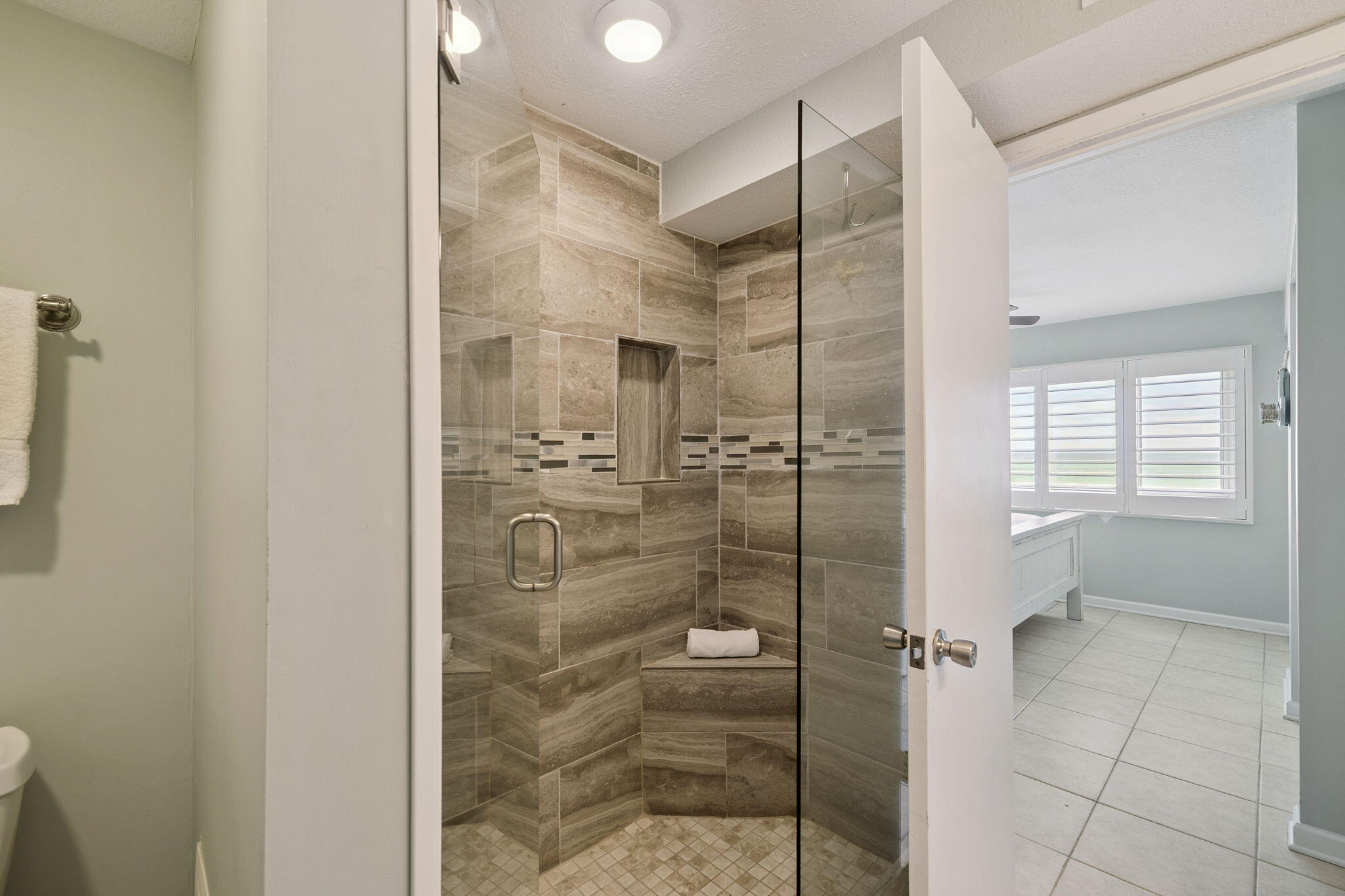 23223 Front Beach Road, Unit C3201 Panama City Beach, FL 32413 - Photo 36 of 45 a bathroom with a shower and a sink