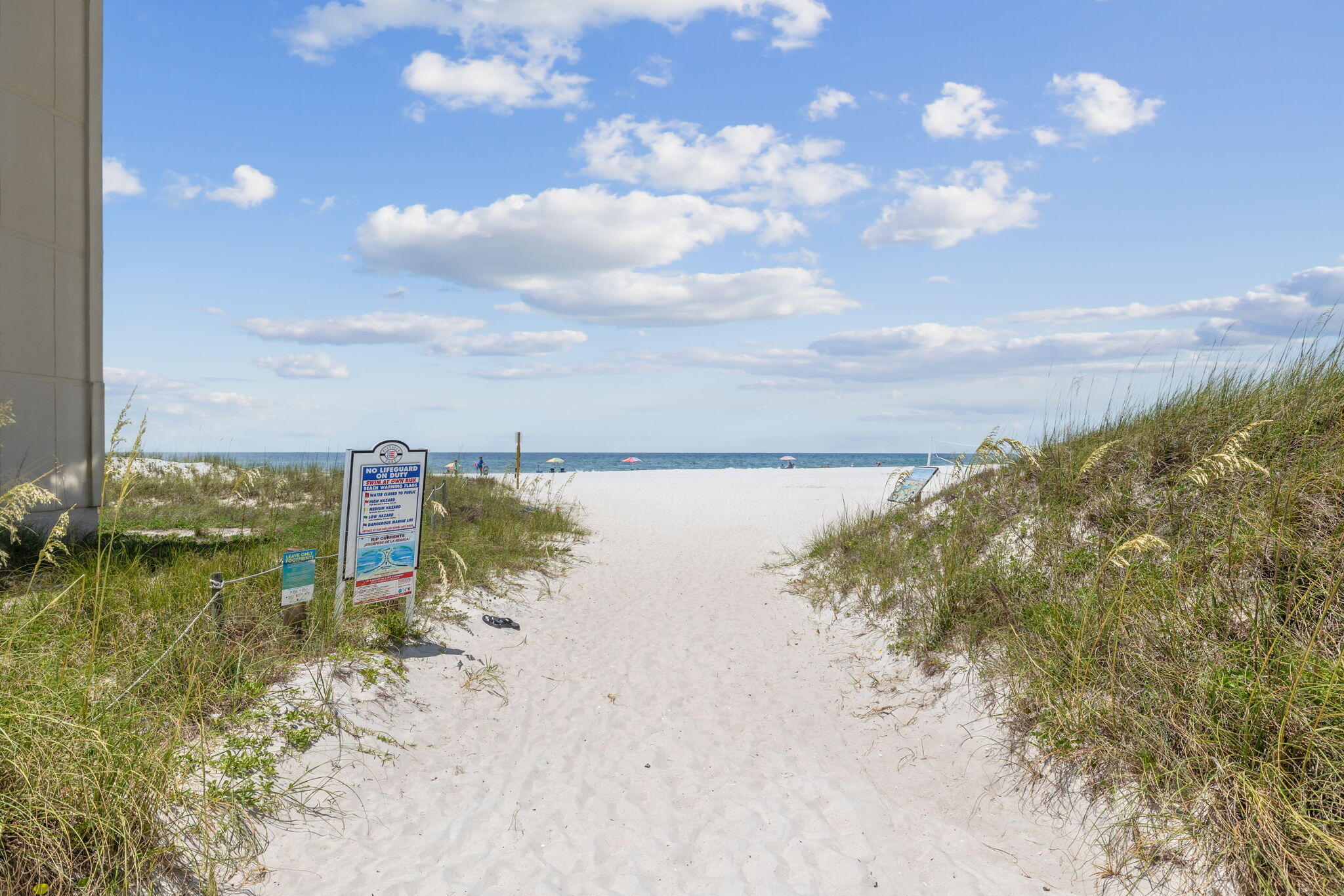 23223 Front Beach Road, Unit C3201 Panama City Beach, FL 32413 - Photo 39 of 45 a view of a lake with a yard