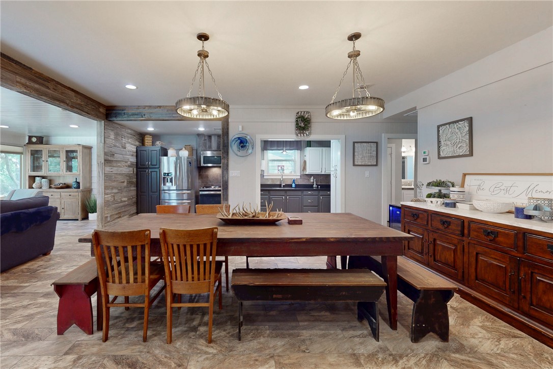 11092 Riley Green Road Franklin, TX 77856 - Photo 11 of 32 Dining space with beam ceiling and sink