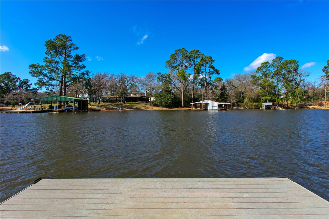 11092 Riley Green Road Franklin, TX 77856 - Photo 27 of 32 Dock area featuring a water view
