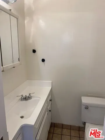 a bathroom with a sink and a toilet