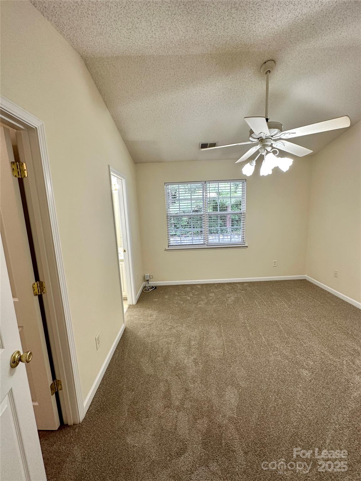 8348 Rudolph Road Charlotte, NC 28216 - Photo 10 of 14 a view of a livingroom with a window