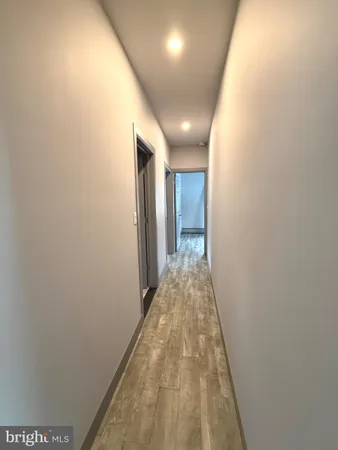 a view of hallway with stairs