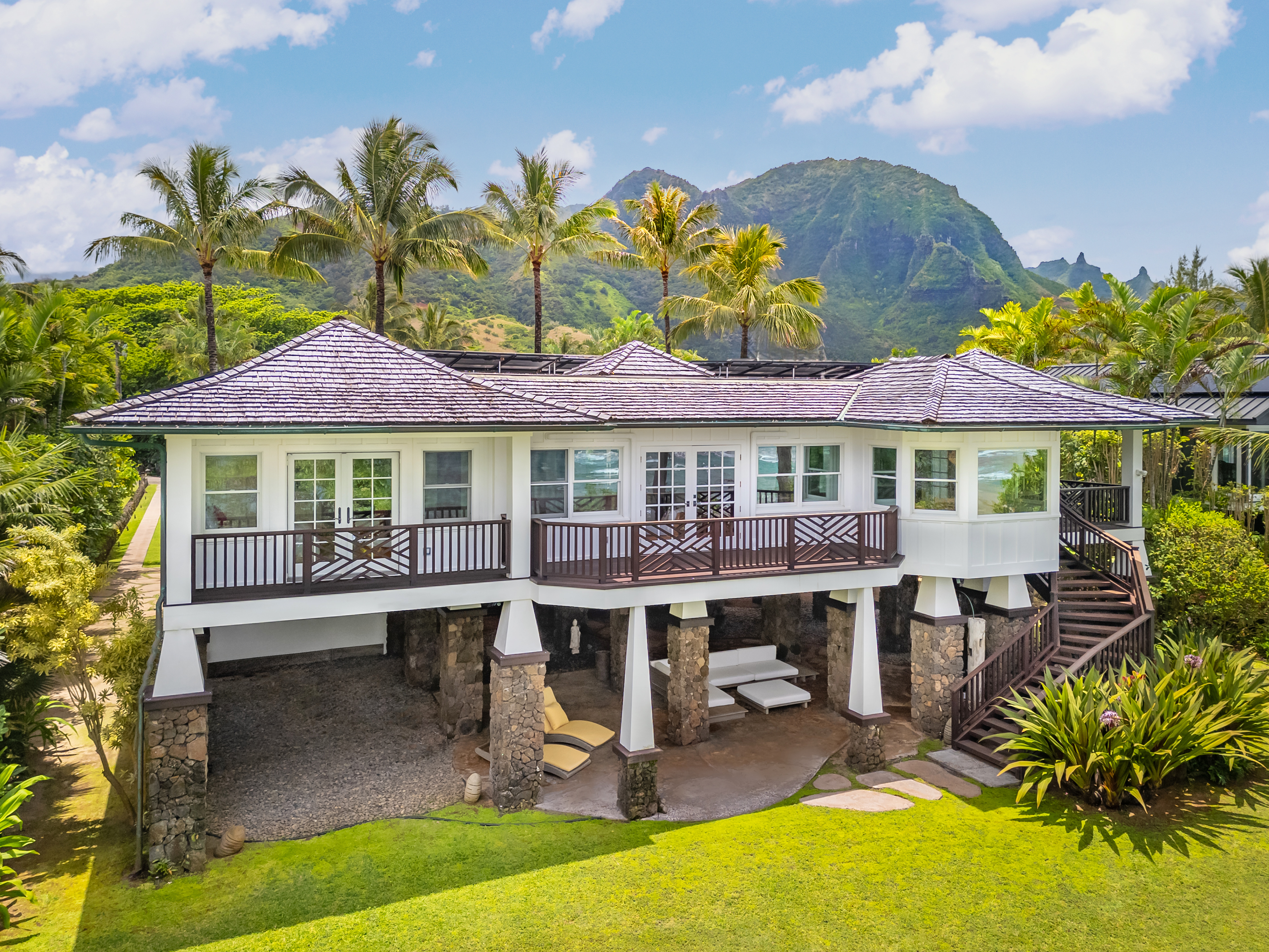 7336 Alealea Road Hanalei, HI 96714 - Photo 2 of 30 a view of a house with a swimming pool and sitting area