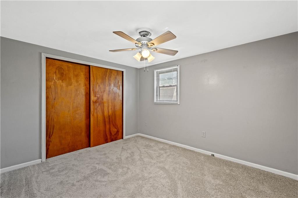 561 Allendale Road New Brighton, PA 15066 - Photo 12 of 25 a view of an empty room with a window
