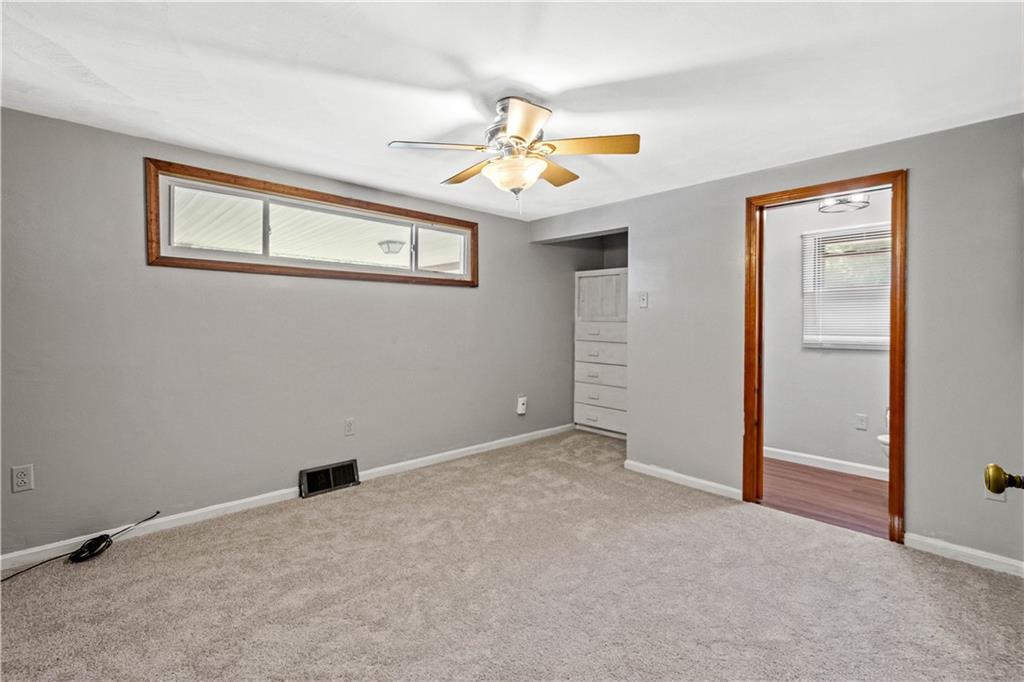561 Allendale Road New Brighton, PA 15066 - Photo 16 of 25 an empty room with windows and fan