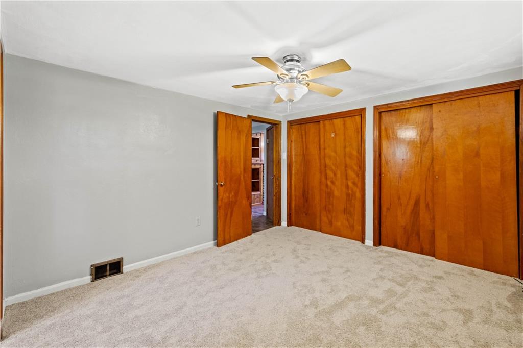 561 Allendale Road New Brighton, PA 15066 - Photo 17 of 25 a view of an empty room with a window
