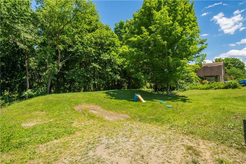 561 Allendale Road New Brighton, PA 15066 - Photo 21 of 25 a view of a swimming pool with a yard