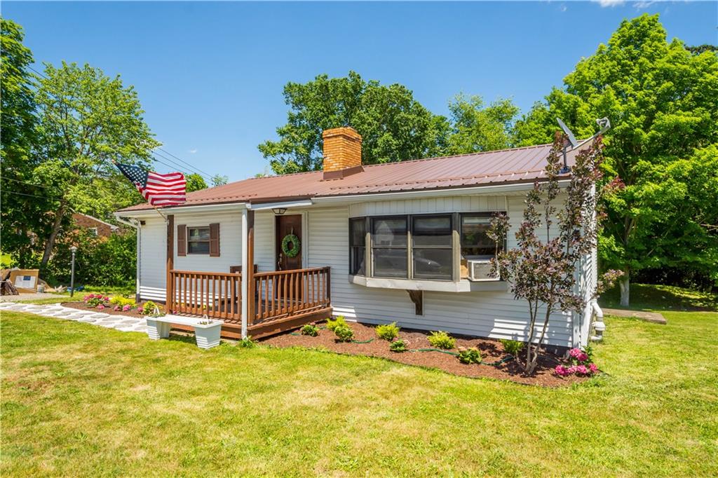 561 Allendale Road New Brighton, PA 15066 - Photo 3 of 25 a view of a house with a yard patio and swimming pool