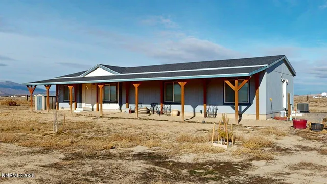 a front view of house with outdoor space