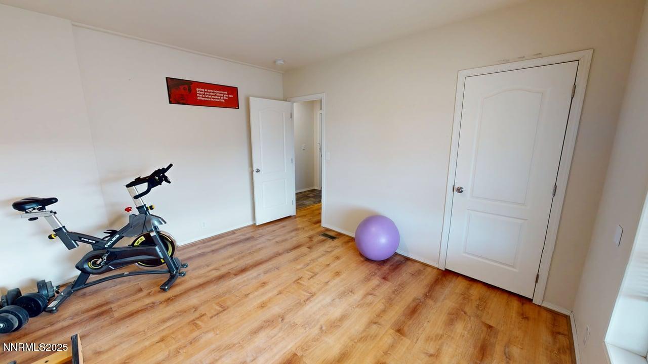 1930 Moccasin Road Battle Mountain, NV 89820 - Photo 25 of 36 a view of a room with wooden floor and gym equipment