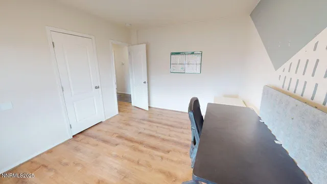 a view of a livingroom with a large window