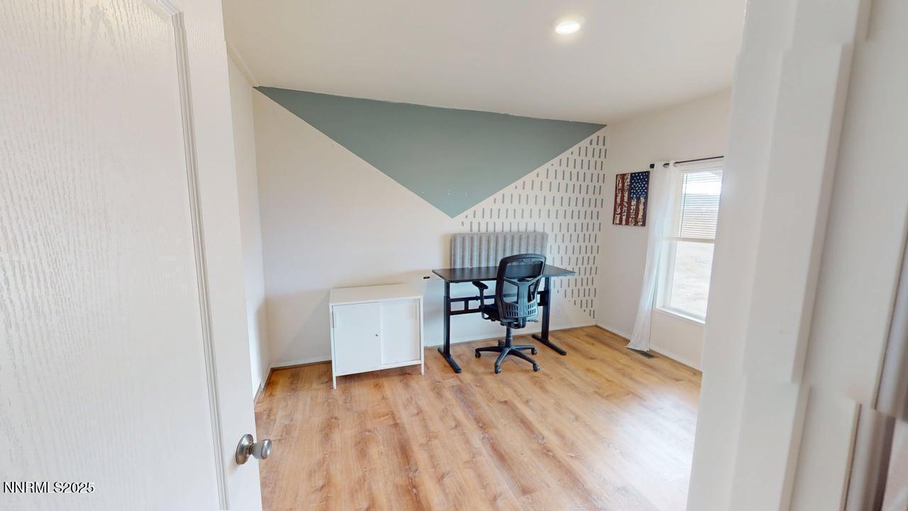 1930 Moccasin Road Battle Mountain, NV 89820 - Photo 29 of 36 a view of a workspace with furniture and a window