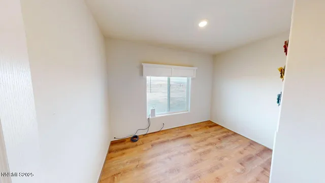 an empty room with a window