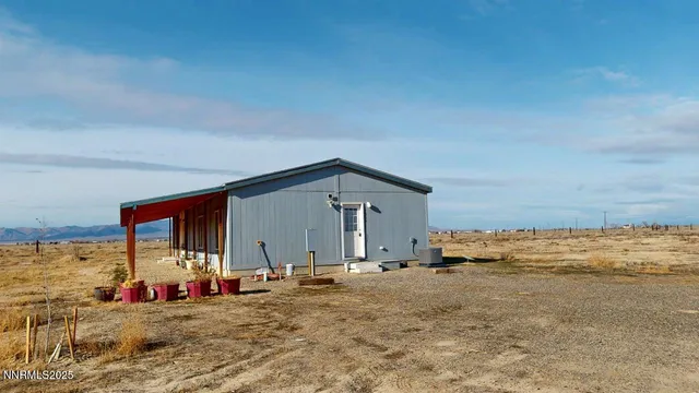 a view of a house with a ocean view