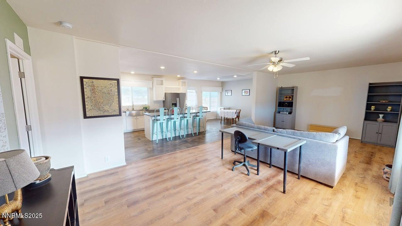 1930 Moccasin Road Battle Mountain, NV 89820 - Photo 8 of 36 a living room with furniture and kitchen view