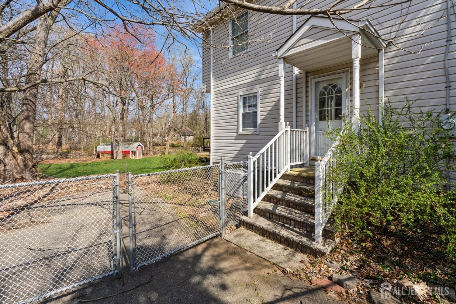 4 Stark Place Edison, NJ 08820 - Photo 4 of 12 a view of a house with a yard