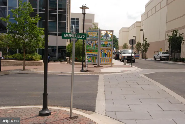 a view of a street with cars