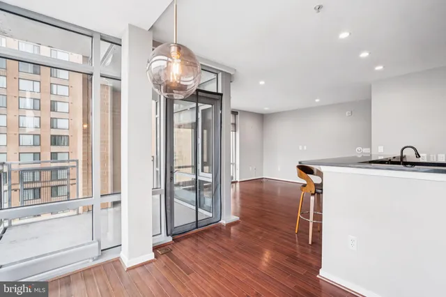 a view of a livingroom with furniture and wooden floor