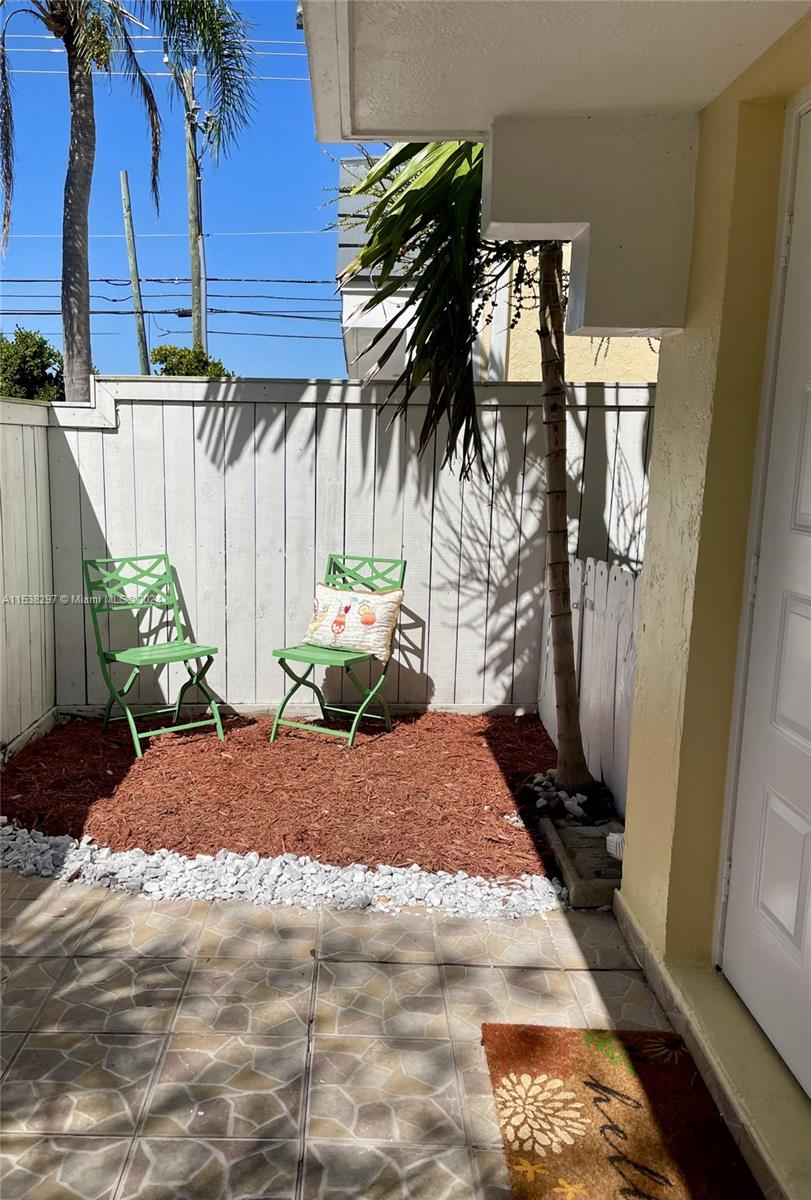 4530 Southwest 68th Ct Circle, Unit 356 Miami, FL 33155 - Photo 3 of 20 a view of a backyard of a house