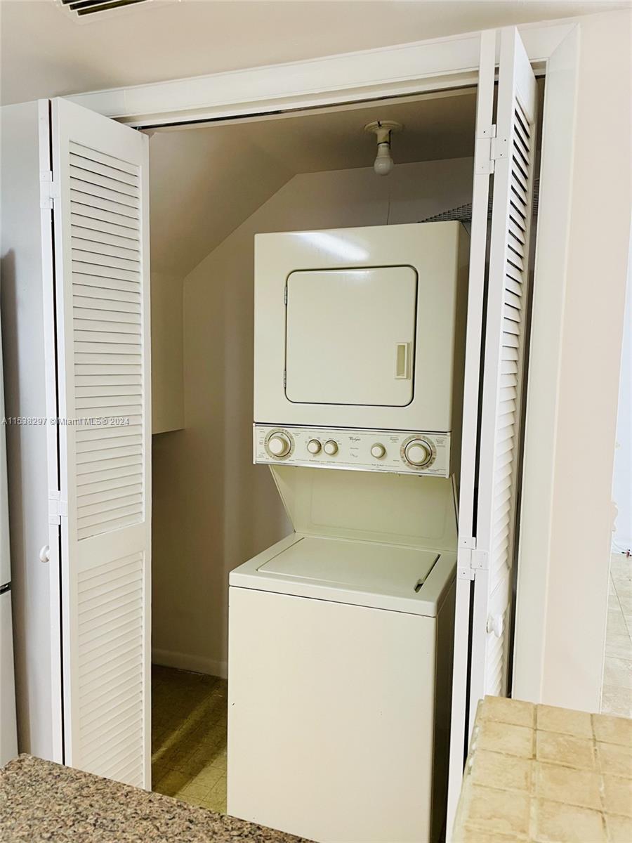 4530 Southwest 68th Ct Circle, Unit 356 Miami, FL 33155 - Photo 7 of 20 a utility room with dryer and washer