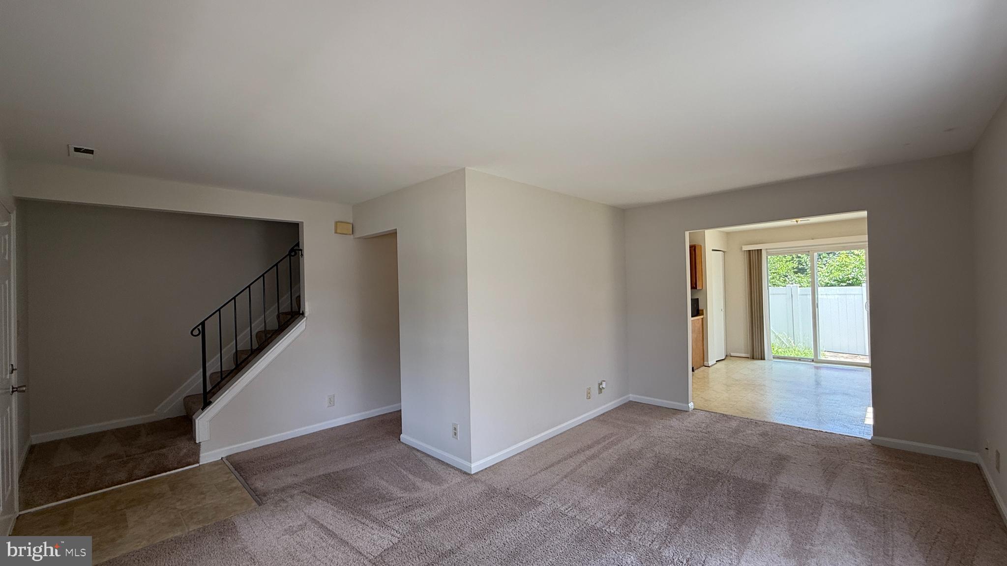 200 Surry Lane, Unit 118 Stafford, VA 22556 - Photo 5 of 13 a view of an empty room with stairs